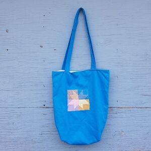 Patch & Roam sky blue small tote bag with pastel sawtooth star patch